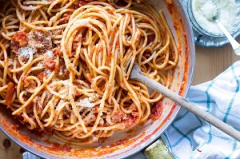 Matricana Pasta (Tomato sauce,soya mince,cheese,onion chilly)-Biryani Queen