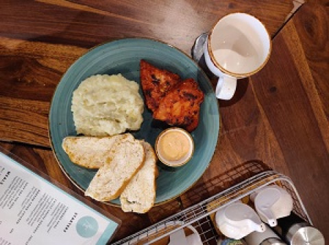 PERI-PERI MEAL (peri peri marinated smokey chicken hitting the right notes of sweet,salty,and tang! Mash potatoes and bread to go  along with it.)- Kore Coffee House